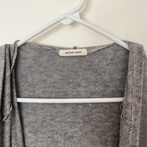 yellow chair Grey Hooded Cardigan. Purchased at Bohme.